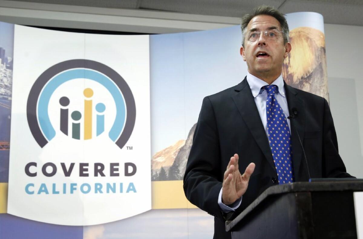 Covered California's executive director, Peter Lee, announced new enrollment figures Tuesday and reminded consumers to be ready for new tax notices related to the health law.