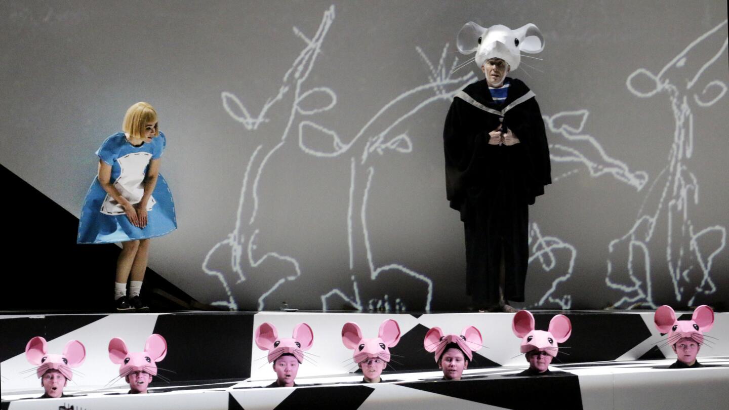Rachele Gilmore as Alice and Christopher Lemmings as Mouse with supernumeraries in "Alice in Wonderland" with Susanna Malkki conducting the Los Angeles Philharmonic at Walt Disney Concert Hall.