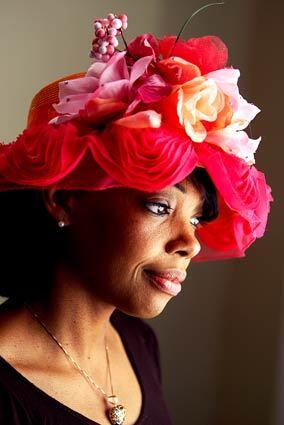 Though the world has gotten much more casual in recent decades, and hats are far less ubiquitous, hat culture remains alive and well in many of the nation's black churches. These 'church crowns' are about devotion with a touch of something delightful, and wearing them takes a bundle of attitude and self-esteem. Meeka Robinson-Davis, pictured in a red chapeau decorated with red, pink and yellow flowers, is a second-generation hat maker. She runs the Slauson Avenue branch of the store her mother Sonja Robinson founded, One-of-a-Kind Hats on Crenshaw Boulevard in Los Angeles.