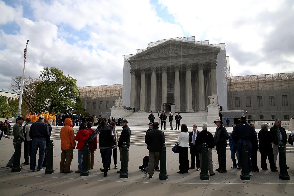 People line up to enter the Supreme Court.