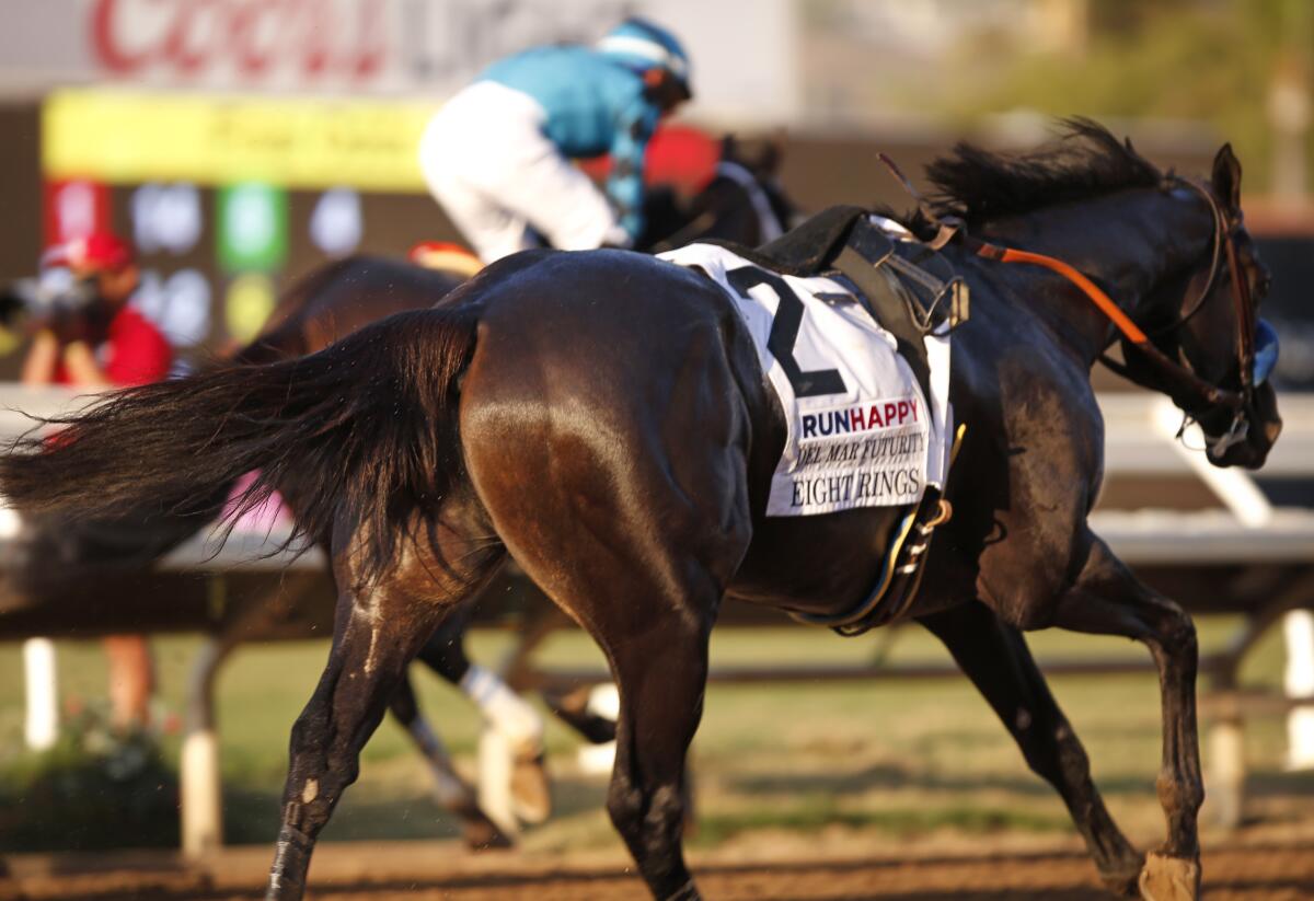 Riderless horse Eight Rings crosses the finish line at the Del Mar Futurity on Sept. 2.