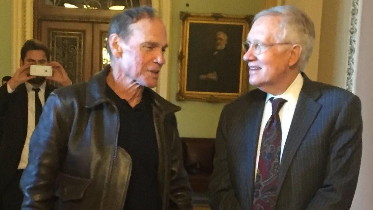 Artist Michael Heizer and Sen. Harry Reid (D-Nev.) in the Capitol