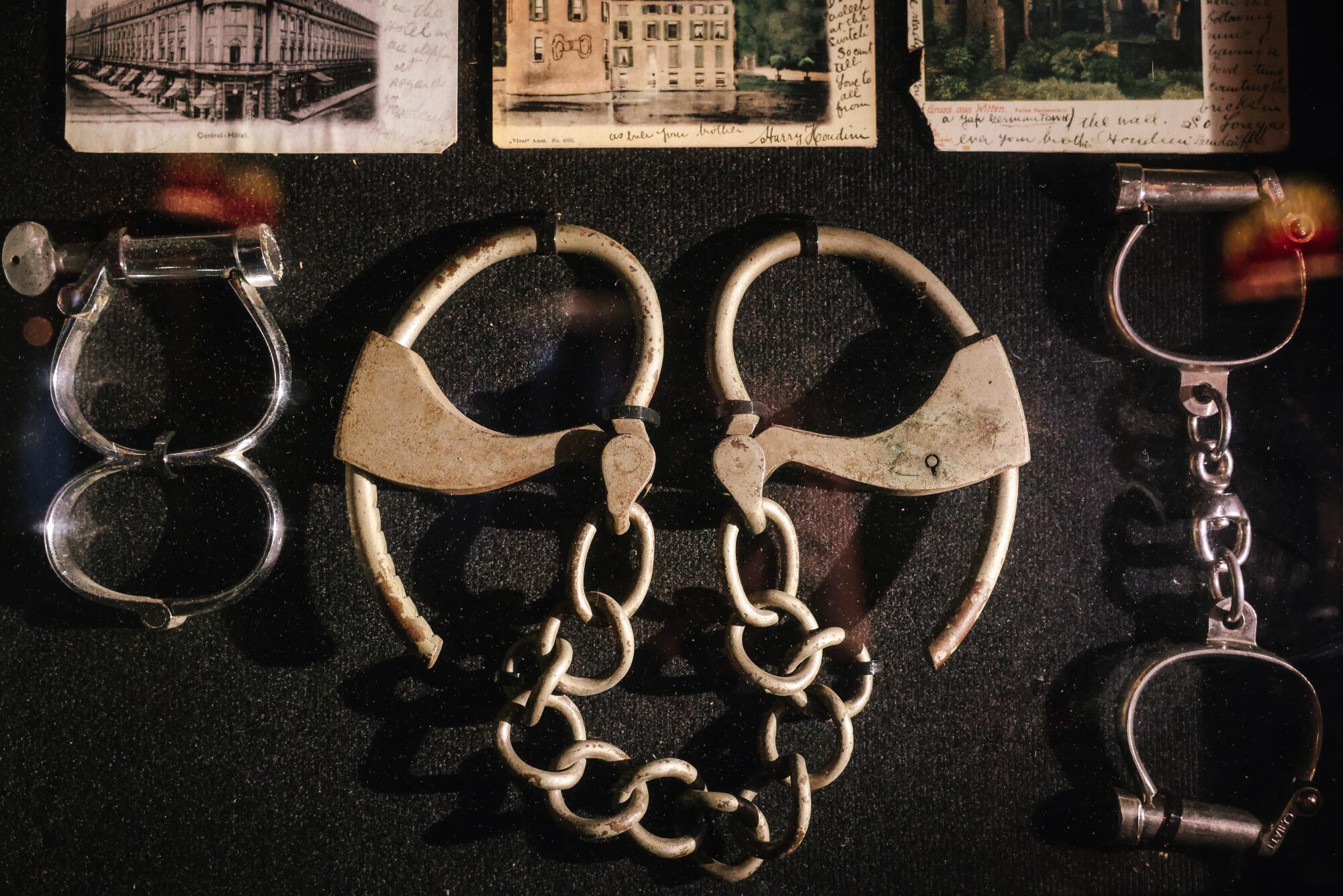 Handcuffs used by Harry Houdini hang inside one of the private dining rooms at the Magic Castle.