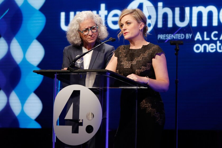 Dr. Jane Aronson, left, and Amy Poehler onstage at the 2nd annual Unite4:Humanity.