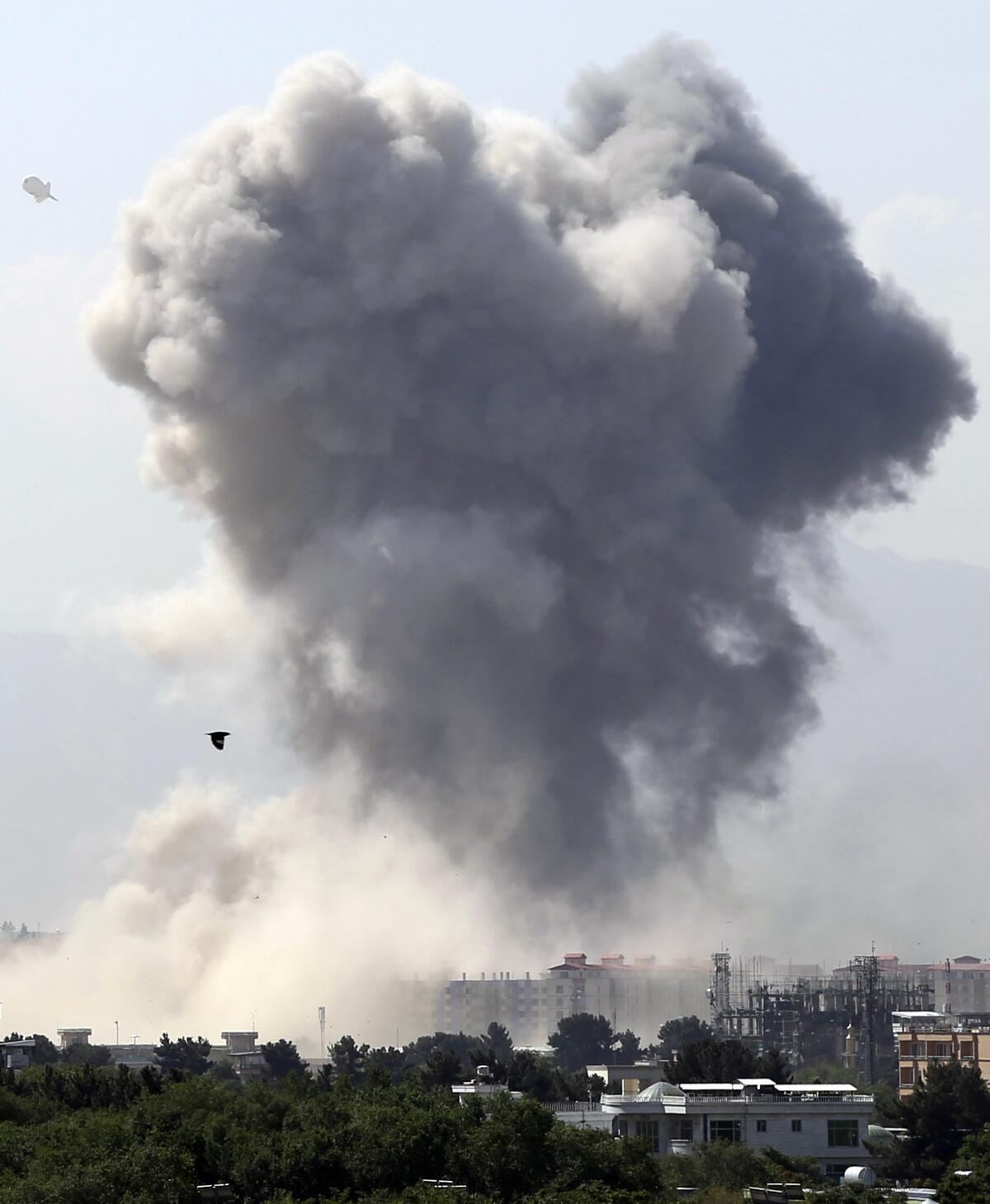 Smokes rises after an explosion in Kabul, Afghanistan, on Monday.