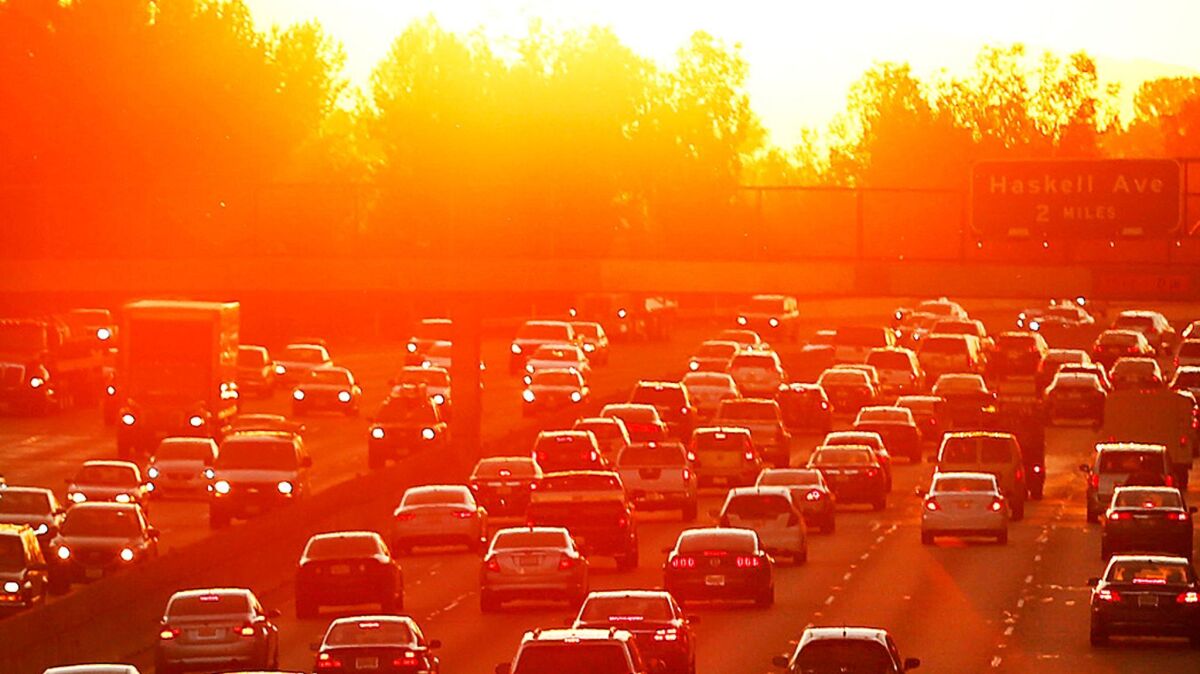 Traffic on the 101 Freeway backs up on March 27, 2015, the second day of a heat wave. As 2016 closes, it is expected to beat 2015 for the hottest year in recorded history.