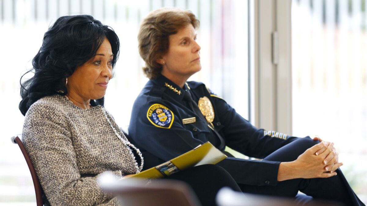 File photo of former City Council President Myrtle Cole, left, and former Police Chief Shelley Zimmerman listening during a meeting of the Citizens Advisory Board on Police/Community Relations at Skyline Hills Public Library in April 2017.
