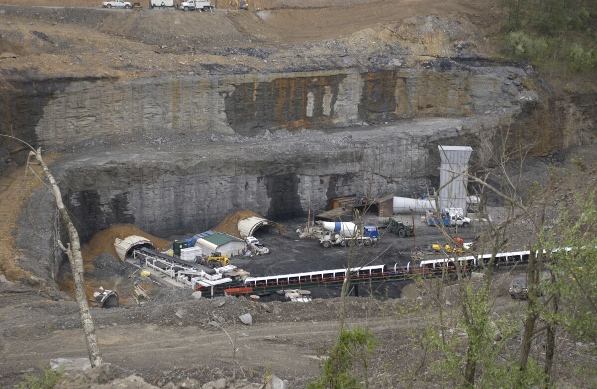 FILE - This April 14, 2009, file photo, shows the new Parkway underground mine in Central City, Ky. A group of former coal company officials will go on trial in Kentucky next week for allegedly skirting federal rules meant to reduce deadly dust in underground mines. The four men on trial, who worked for now-bankrupt Armstrong Coal, ordered workers at two Kentucky mines, including the Parkway mine, to rig dust-monitoring equipment to pass air quality tests, federal prosecutors said. (AP Photo/Daniel R. Patmore, File)