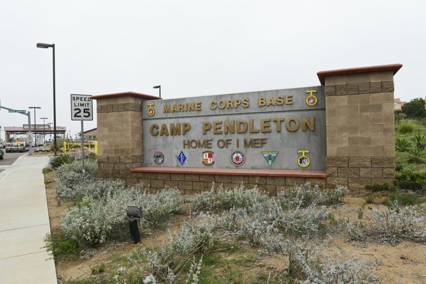 Camp Pendleton Marine Corps Base sign outside the main gate of the base in Oceanside.