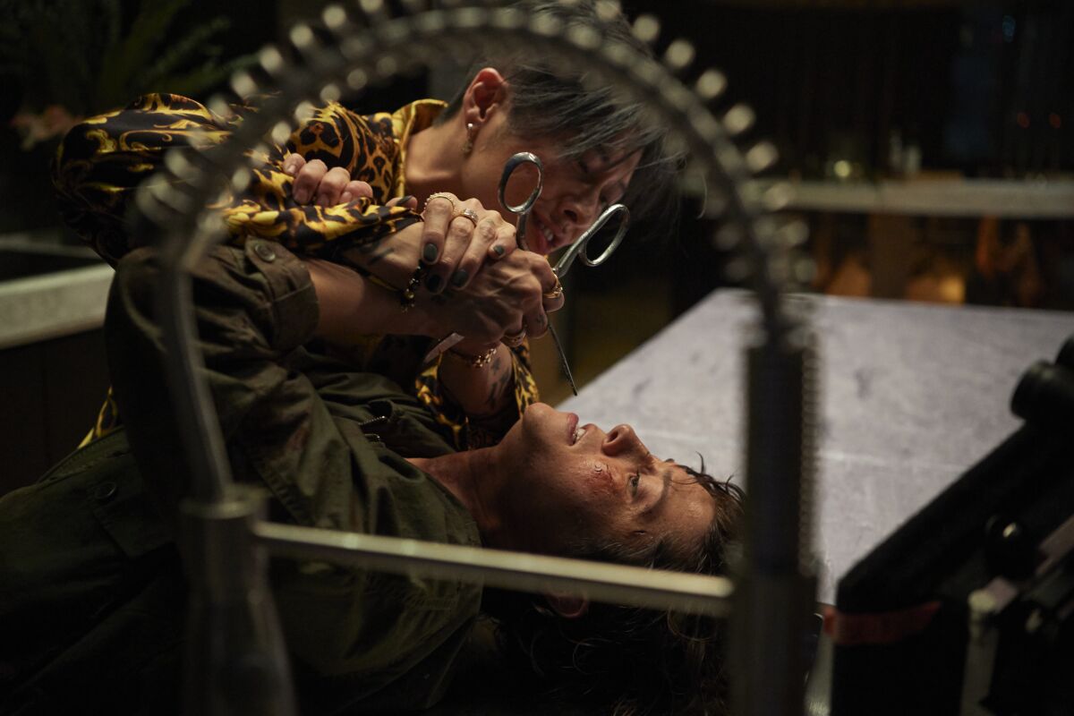 Mary Elizabeth Winstead and Miyavi fight in a scene from "Kate."