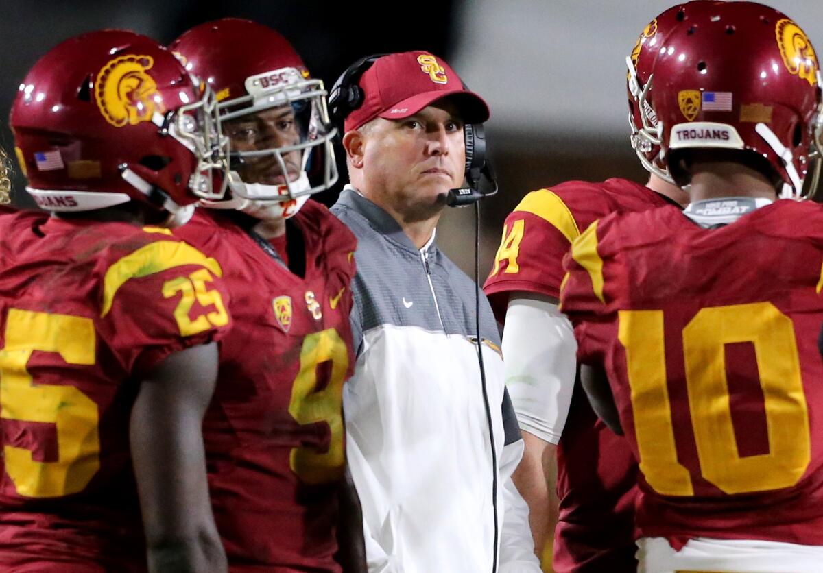 USC Coach Clay Helton looks on from the sidelines against California on Oct. 27.