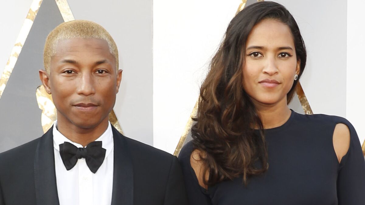 Pharrell Williams and wife Helen Lasichanh at the 88th Academy Awards on Feb. 28, 2016.