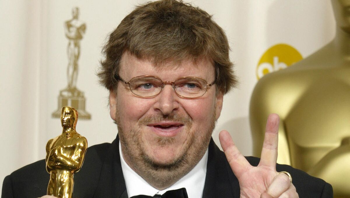 Most winners don't even have time to finish their thank-yous before the cut-off music switches on, but filmmaker Michael Moore managed to squeeze in a whole political rant after snagging a best documentary win for "Bowling for Columbine." "We live in the time where we have fictitious election results that elects a fictitious president," he said to an A-lister crowd that quickly took sides. The boos and cheers were very, very audible.
