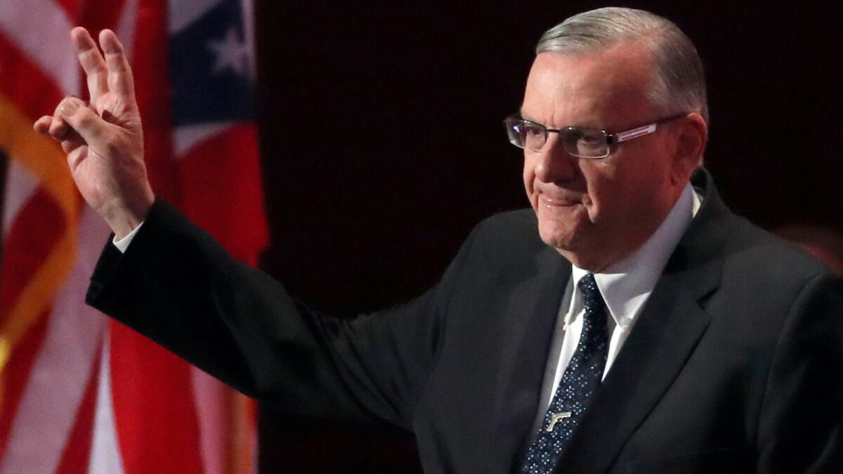 Sheriff Joe Arpaio, of Arizona, walks onto the stage to speak during the final day of the Republican National Convention in Cleveland in July. Arpaio was decisively defeated in the election on Nov. 8.