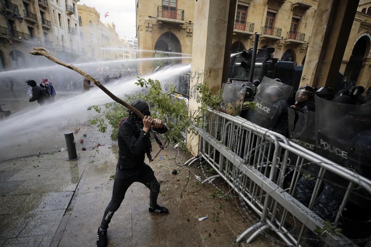 Riots broke out during a march against the ruling elite in Beirut, Lebanon, on  Jan. 18, 2020. 