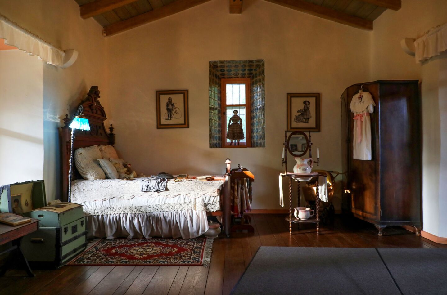 Late afternoon view of a children's bedroom of the Rancho Buena Vista Adobe. This is the original adobe room built in 1852 and is known among staff and visitors as the "stinky room" because visitors associate it with the smell of horse manure and feed.