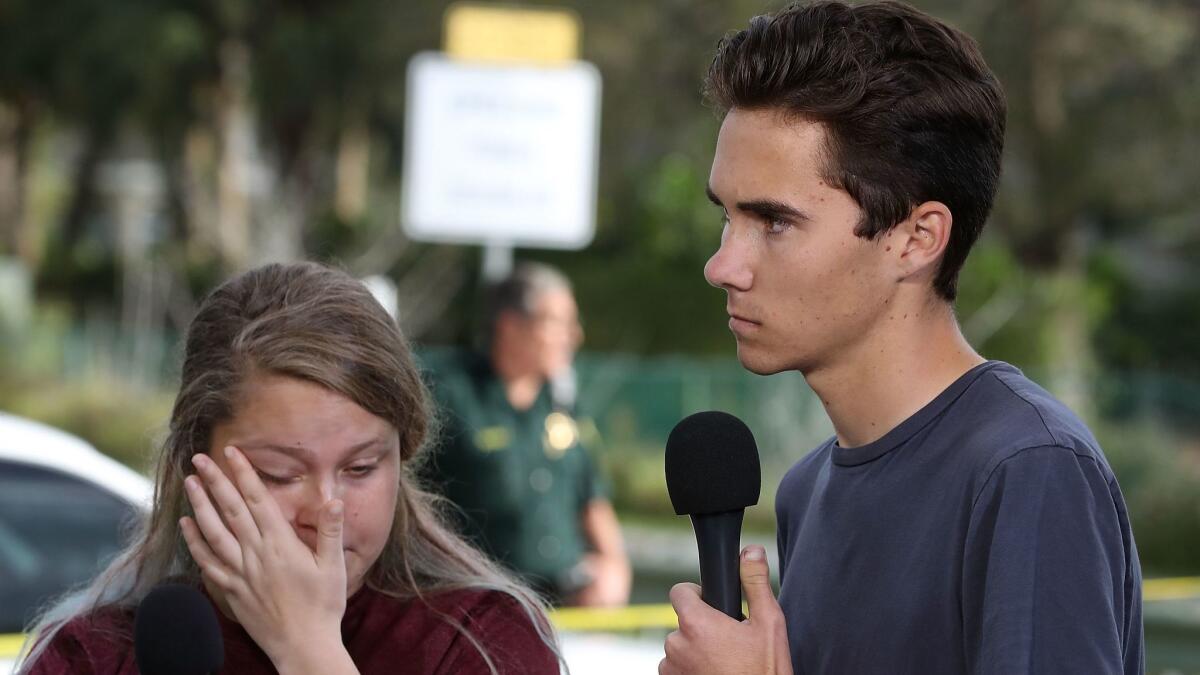Marjory Stoneman Douglas High School student David Hogg, right, has been the target of attacks accusing him of being an actor.