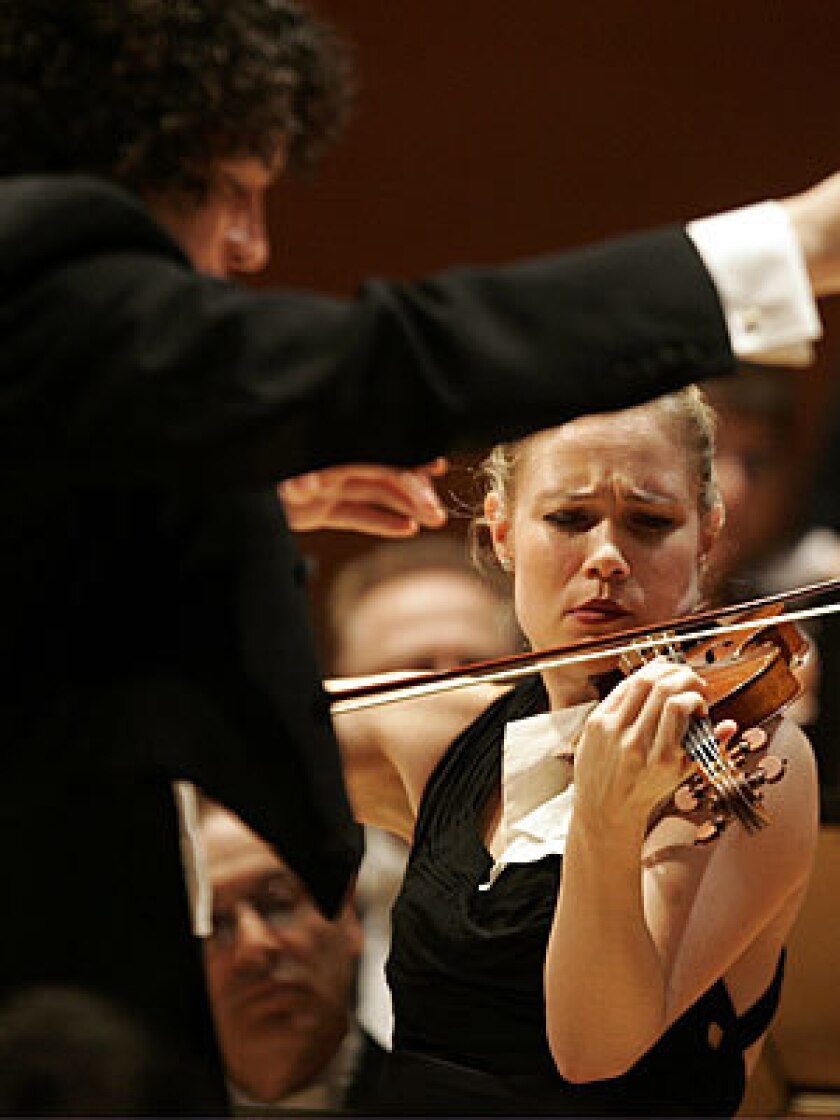 SPIRIT MOVES THEM: Gustavo Dudamel and Leila Josefowicz are impressive and spry.