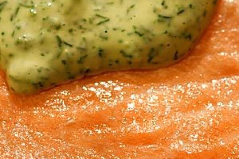 Oven-steamed salmon with dill sauce.