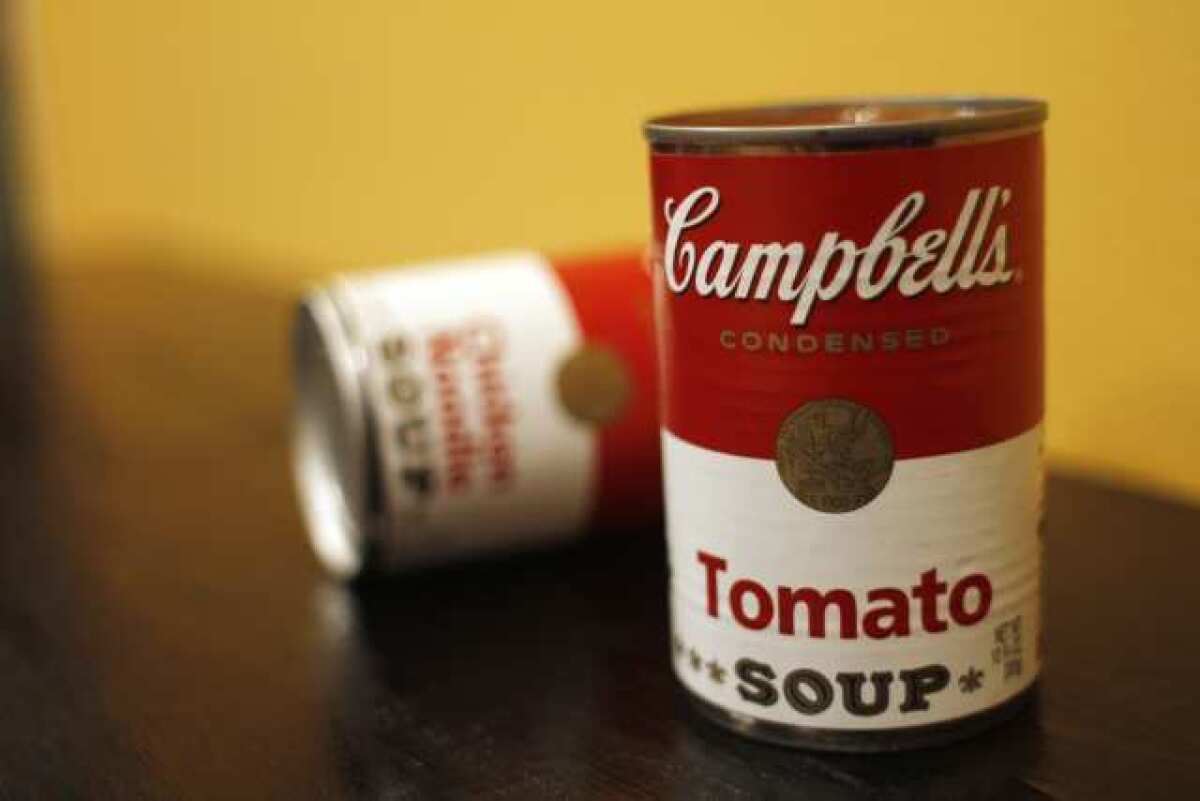Campbell Soup Co.'s net income slipped by 5.3% in the latest quarter as it struggled to deal with higher costs for ingredients and sluggish soups sales, the company said Monday.