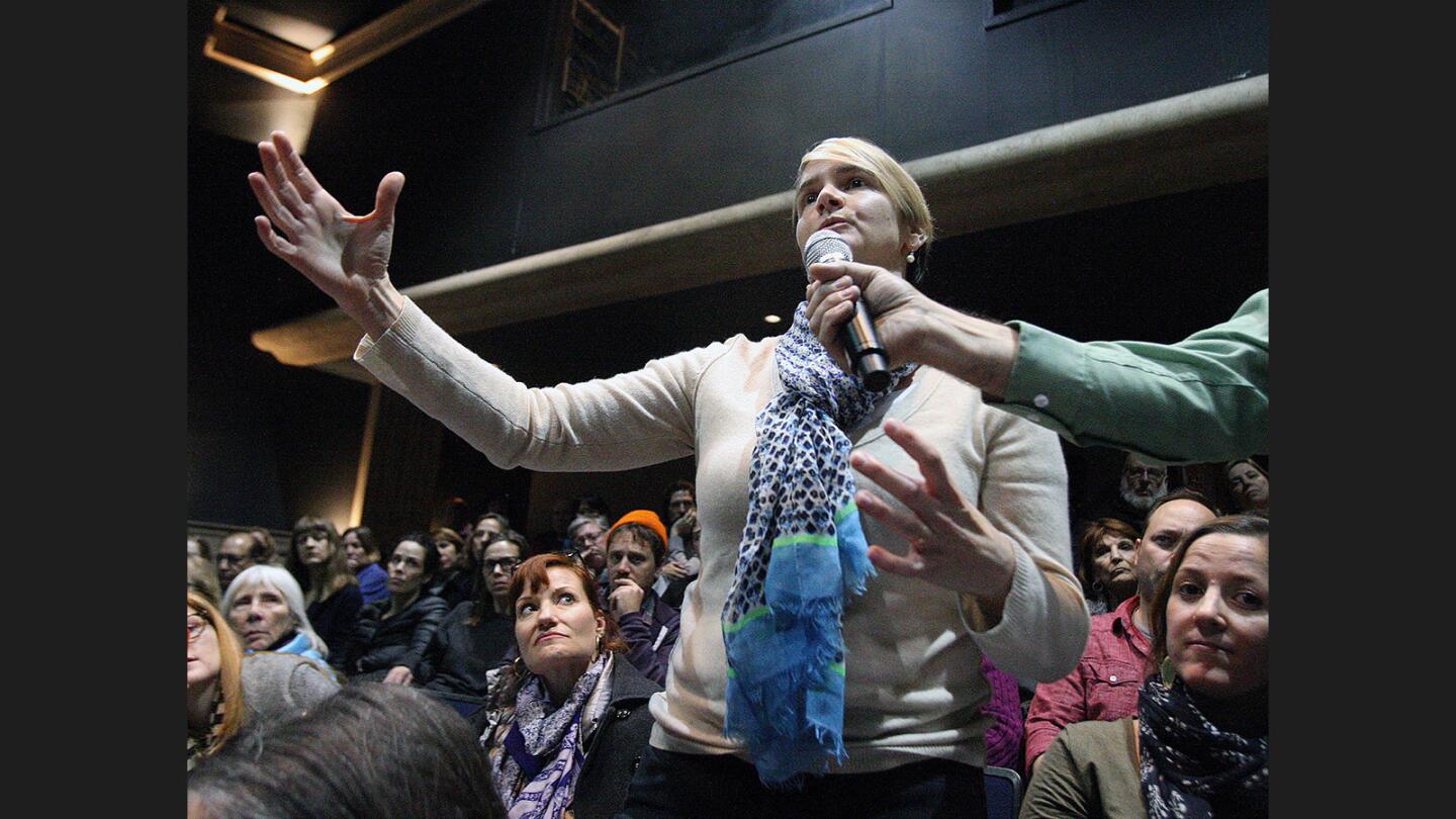Clarissa McPeck, of Pasadena, asks a question directed specifically at Congressman Schiff at a forum lead by the Congressman called Status of the Refugee Program in the Mainstage Theatre Auditorium at Glendale Community College on Friday, February 24, 2017. The theatre, which holds about 400, was nearly at capacity, and the overflow crowd of nearly 800 was sent to the gym to watch video of the panel discussion.