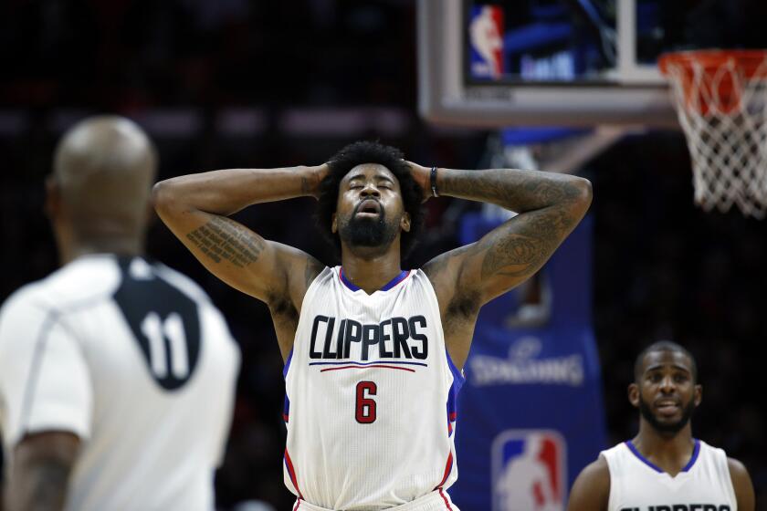 Clippers center DeAndre Jordan catches his breath during a break in the action against Minnesota Timberwolves at Staples Center on Wednesday.