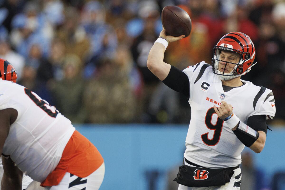 Cincinnati Bengals quarterback Joe Burrow passes during a divisional playoff win over the Tennessee Titans on Saturday.
