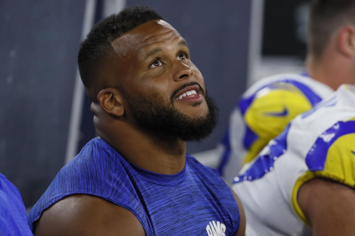 Rams defensive tackle Aaron Donald looks on from the sideline during a preseason game against the Chargers,