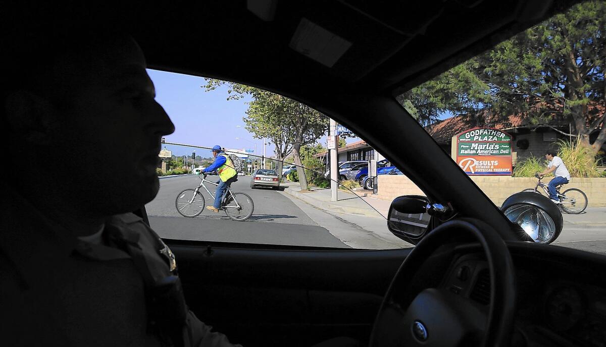 Los Angeles County Sheriff's Deputy Brian Heischuber patrols the Newhall area of Santa Clarita, which has seen a recent rise in violence.