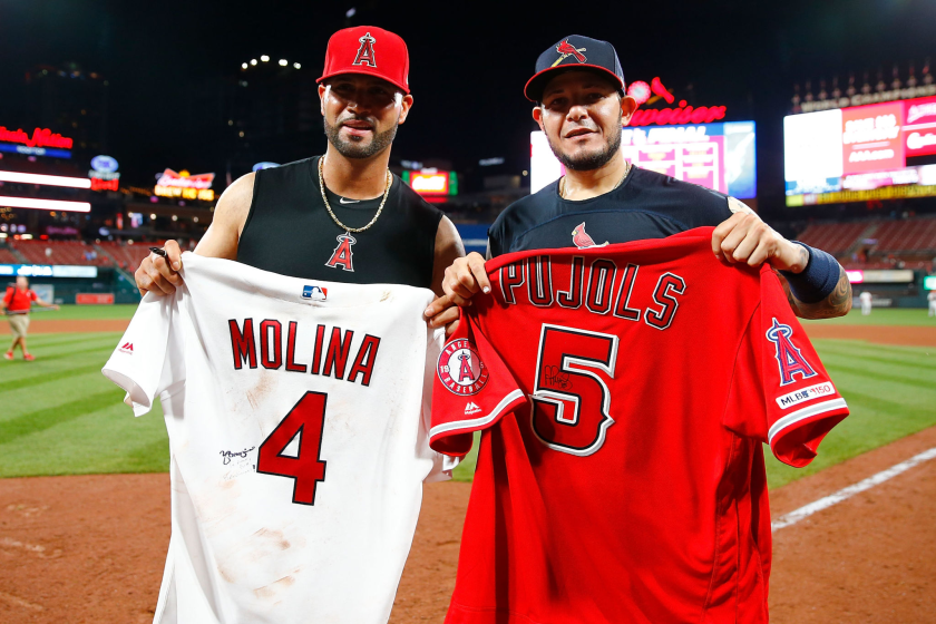 Albert Pujols and Yadier Molina exchange jerseys after a game between the Cardinals and Angels.