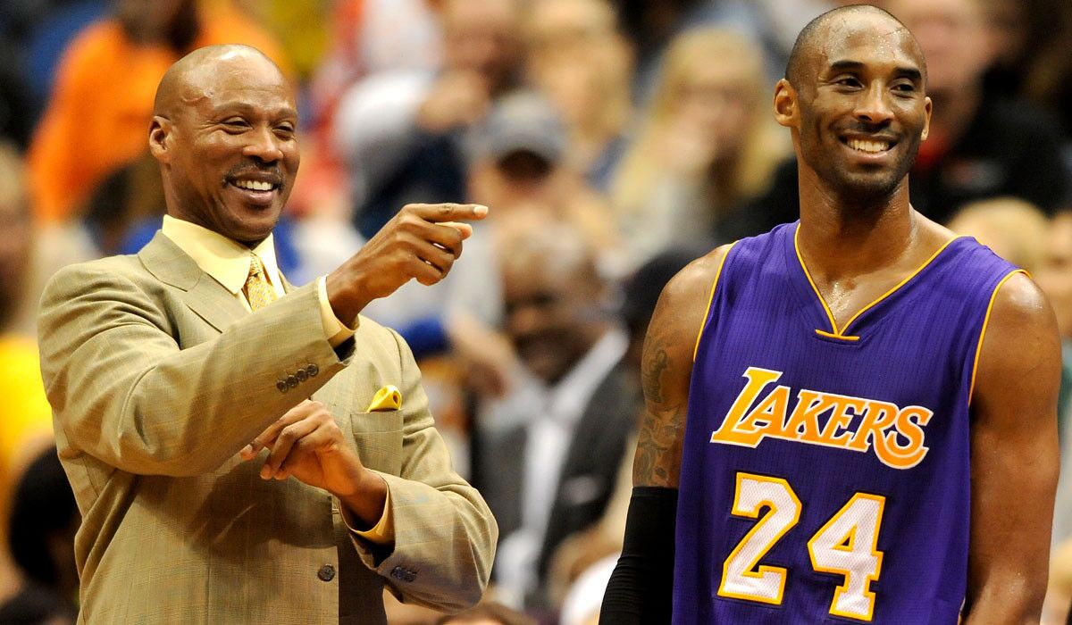 Lakers Coach Byron Scott and guard Kobe Bryant share a lighter moment during a game in Minneapolis earlier this season.
