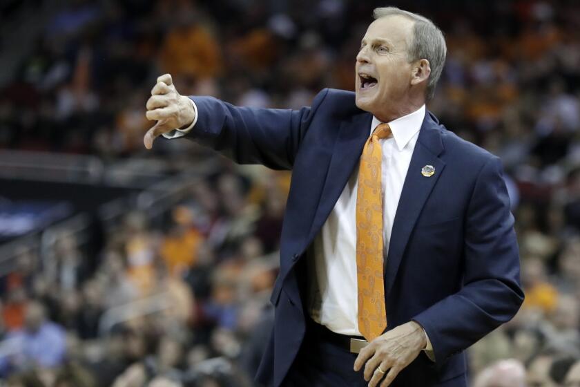 FILE -- In this March 28, 2019, file photo, Tennessee coach Rick Barnes calls a play during the first half of a men's NCAA tournament college basketball South Regional semifinal against Purdue in Louisville, Ky. Barnes believes he'd be settling in as UCLA's coach right about now if buyout negotiations hadn't broken down. (AP Photo/Michael Conroy, File)