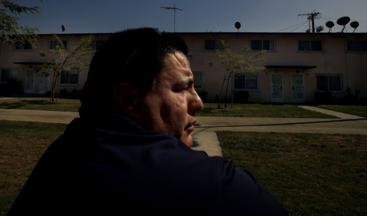 Hector Chacon, 44, visits the Boyle Heights housing project where he grew up. In politics, he and his family have prospered.
