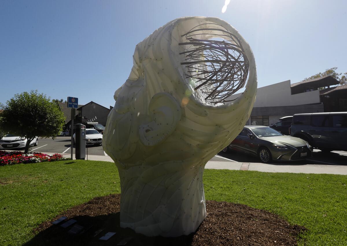 A dedication ceremony was held Thursday for "Inquire Within," a new public art installation in Laguna Beach.