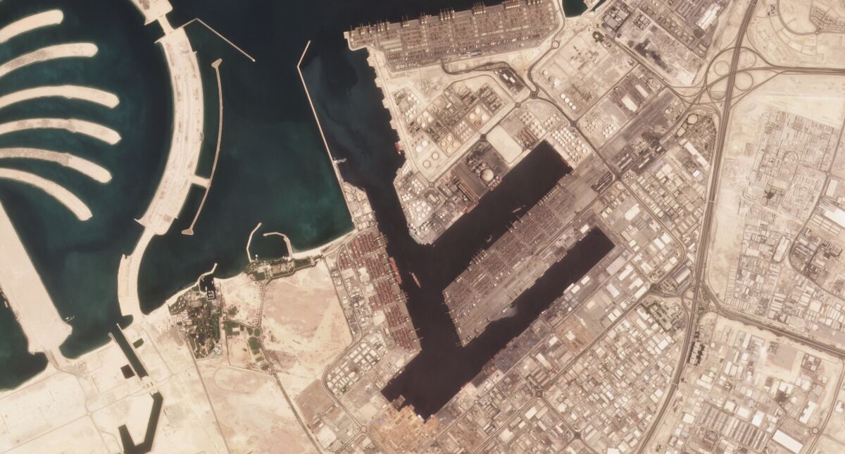 In this satellite photo shot by Planet Labs Inc., the Jebel Ali Port is seen early Wednesday, July 7, 2021, in Dubai, United Arab Emirates. A fiery explosion erupted on a container ship anchored in Dubai at one of the world's largest ports later Wednesday, authorities said, sending tremors across the commercial hub of the United Arab Emirates. (Planet Labs Inc. via AP)