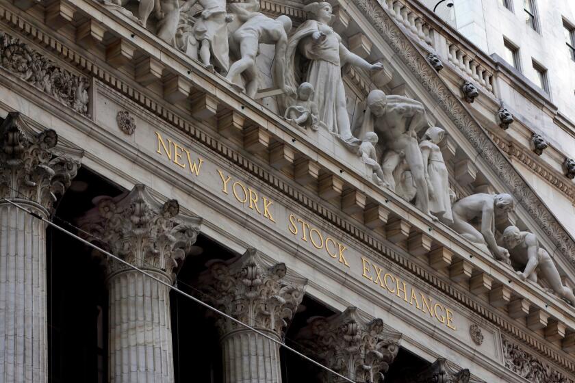 FILE- This April 5, 2018, file photo shows the facade of the New York Stock Exchange. The U.S. stock market opens at 9:30 a.m. EDT on Tuesday, May 1, 2018. (AP Photo/Richard Drew, File)