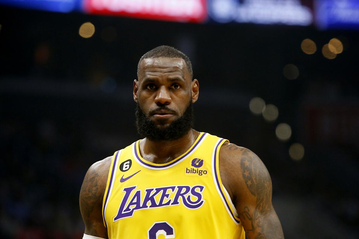 Lakers star LeBron James walks on the court during a loss to the Clippers on Nov. 9.