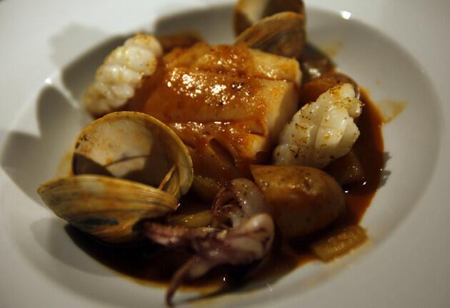 Bourride, a fisherman's stew with cod, mussels, clams and squid. The chef is also a fisherman and knows his seafood.