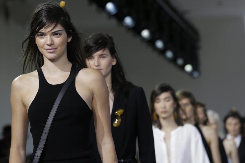 Kendall Jenner leads the models at the presentation of the Spring 2016 collection by Michael Kors.