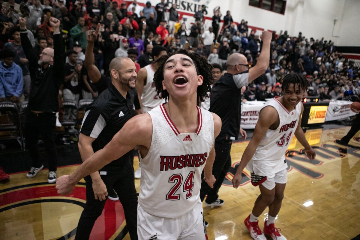Corona Centennial's Jared McCain (24) celebrates winning the Southern California Open Division regional championship