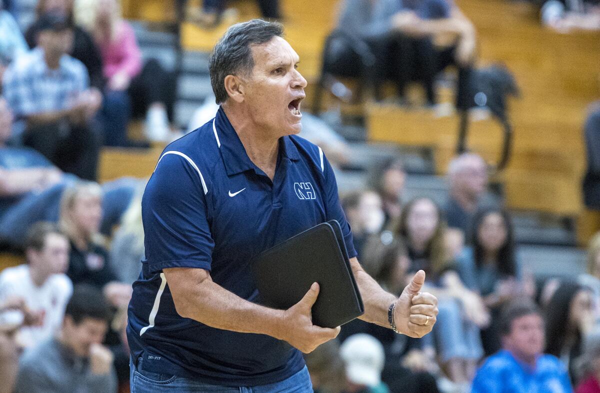 Newport Harbor's coach Rocky Ciarelli yells out directions to his team in a 2018 game.