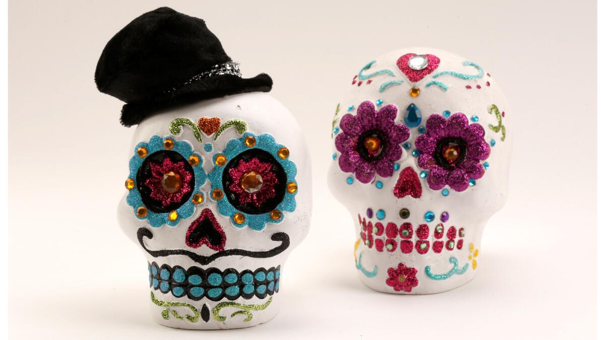 Sugar skull figurines, $5.99, Michaels.