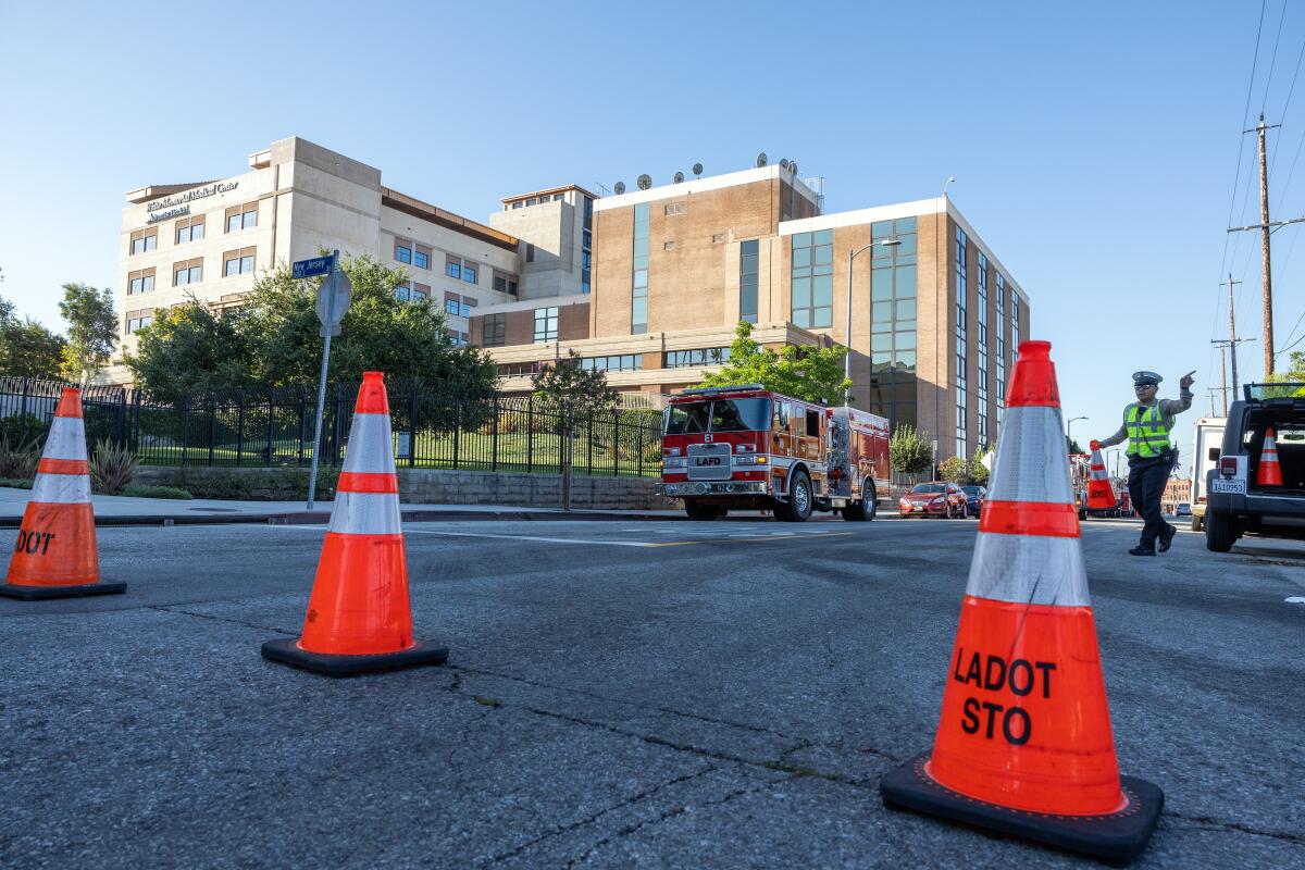 Cones block traffic on Boyle Avenue at Adventist Health White Memorial Hospital