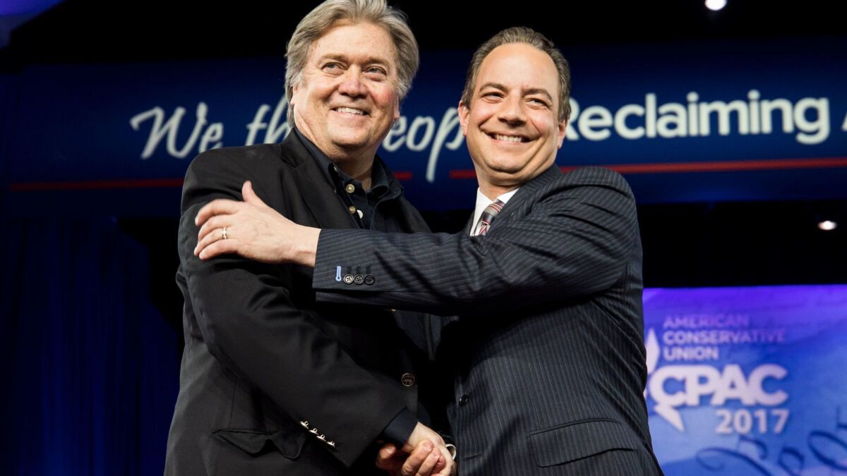 President Trump's chief strategist, Stephen K. Bannon, left, and White House Chief of Staff Reince Priebus prepare to speak Thursday at the Conservative Political Action Conference in National Harbor, Md.