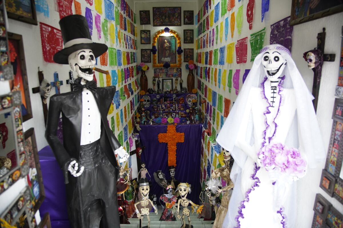A large altar is on display at Ray's Shop on Oct. 24 in Tijuana, Baja California.