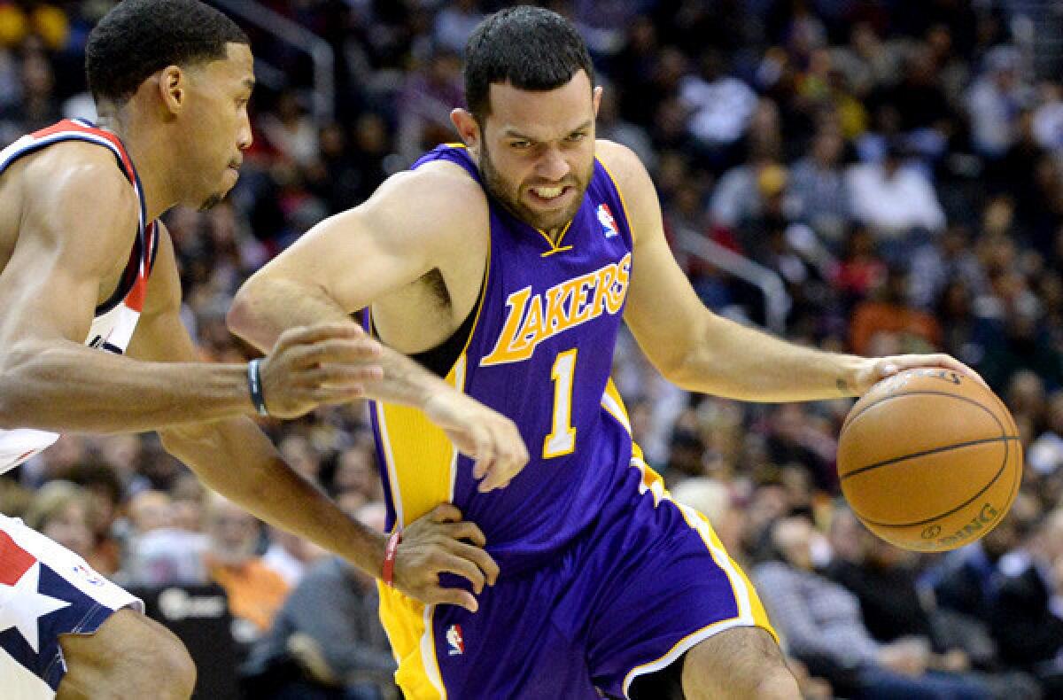 The Lakers will play for the first time in two weeks with a point guard when Jordan Farmar (1) makes his return against the Miami Heat on Wednesday.