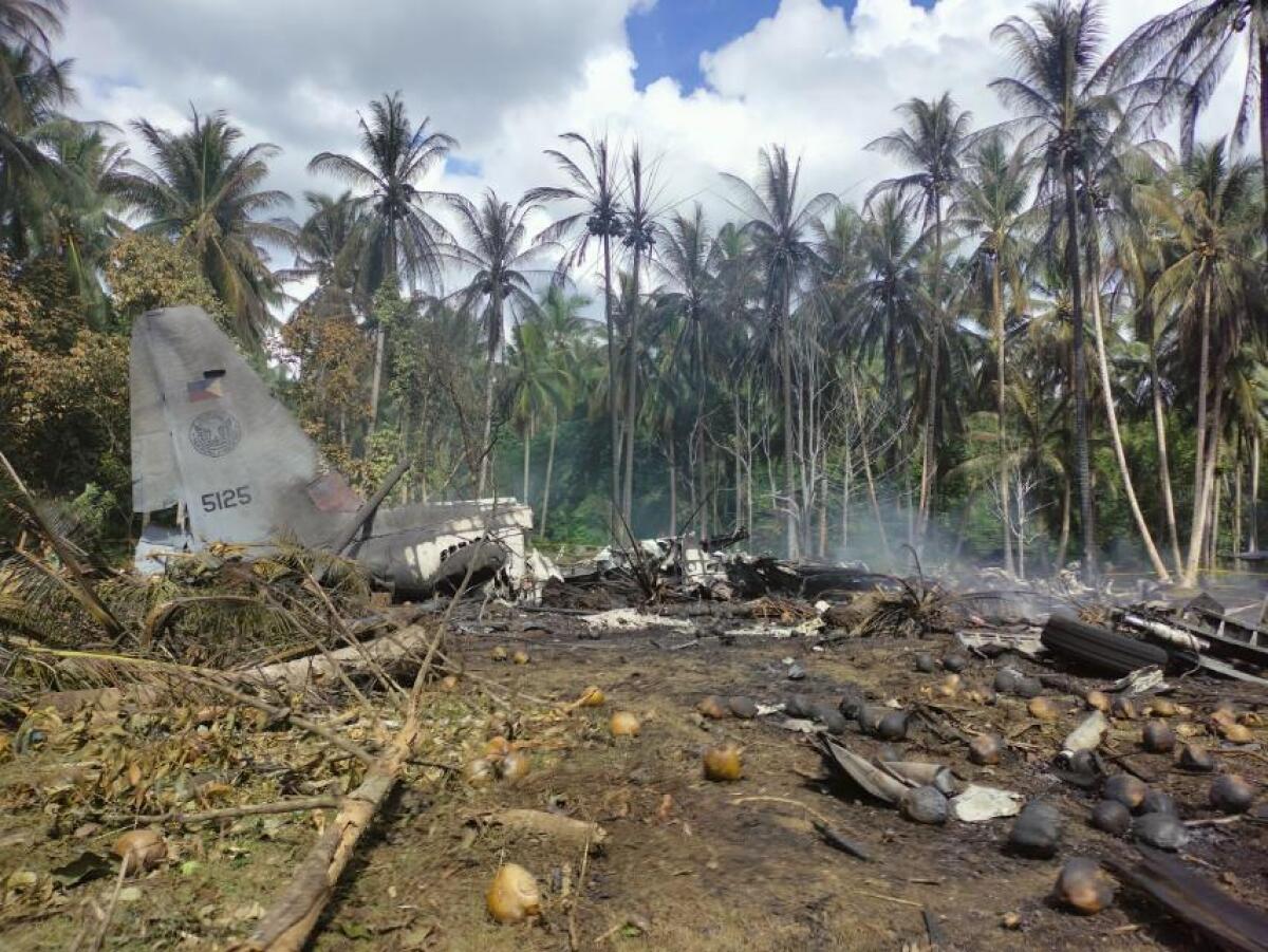 The wreckage of a military C-130 aircraft that crashed in the Philippines on Sunday.