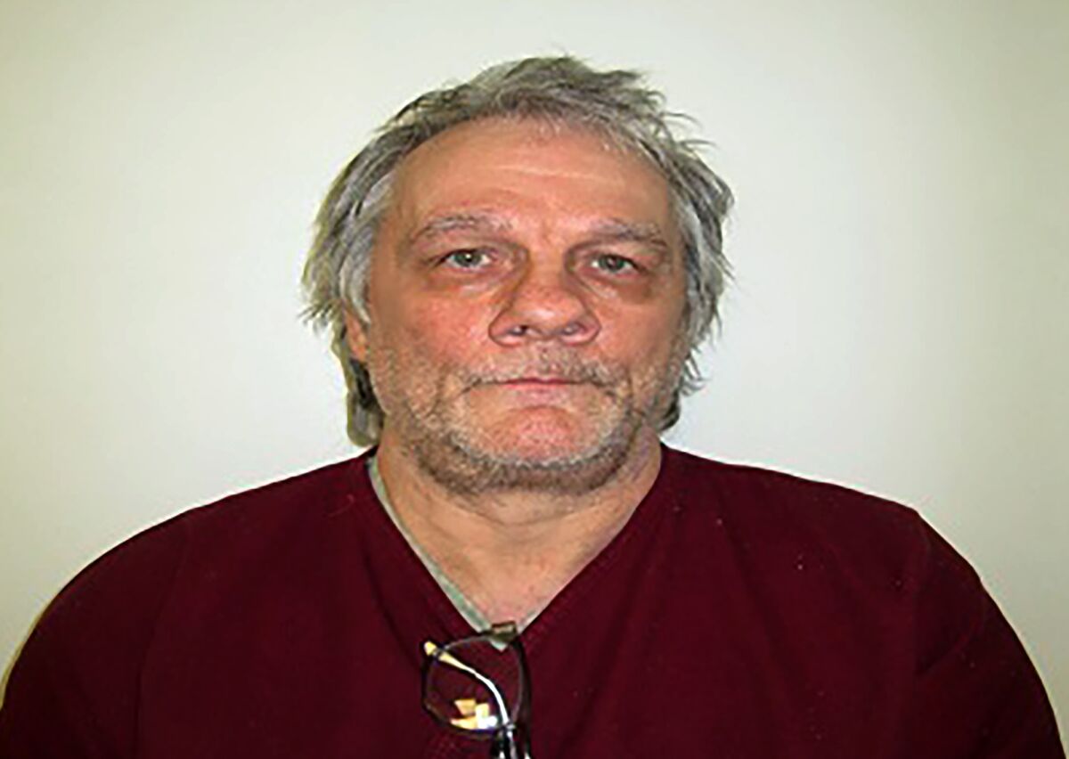 This undated booking photo provided by the Oklahoma Department of Corrections, shows death row inmate Wade Lay. On Monday, Dec. 6, 20212, a state court judge in Oklahoma granted a temporary stay of execution for Lay, convicted of killing a security guard during a 2004 bank robbery in Tulsa. (Oklahoma Department of Corrections via AP)