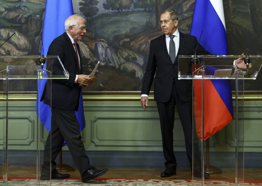 In this photo released by the Russian Foreign Ministry Press Service, Russian Foreign Minister Sergey Lavrov, right, and High Representative of the EU for Foreign Affairs and Security Policy, Josep Borrell leave a joint news conference following their talks in Moscow, Russia, Friday, Feb. 5, 2021. The European Union's top diplomat told Russia's foreign minister Friday that the treatment of Russian opposition leader Alexei Navalny represents "a low point" in the relations between Brussels and Moscow. EU foreign affairs chief Josep Borrell met with Russian Foreign Minister Sergey Lavrov several days after Navalny was ordered to serve nearly three years in prison, a ruling that elicited international outrage. (Russian Foreign Ministry Press Service via AP)