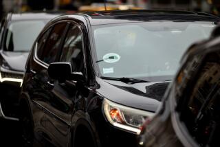 Uber signage on a vehicle in New York, US, on Thursday, Aug. 8, 2024. In the past two weeks, Uber Technologies Inc., DoorDash Inc., Instacart, Grubhub parent Just Eat Takeaway, and Deliveroo Plc have all delivered upbeat earnings reports, suggesting that ride-sharing and food delivery are both entrenched habits baked into consumer's budgets, and serving as a counterpoint to fears that US consumer spending is softening across the board. Photographer: Yuki Iwamura/Bloomberg